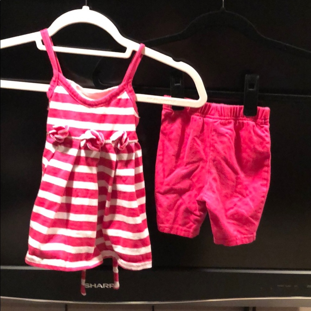 Pink and white shirt with matching pink shorts